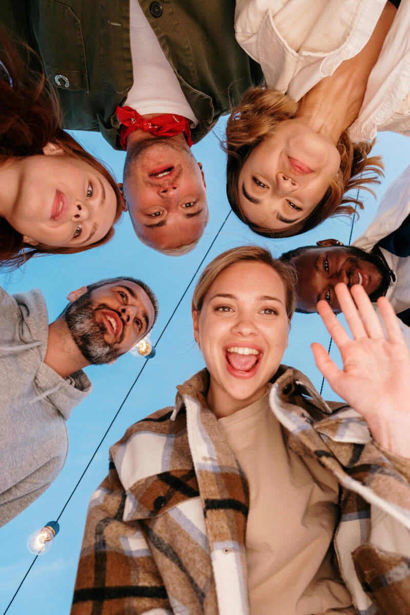 young-adults-hovering-around-camera