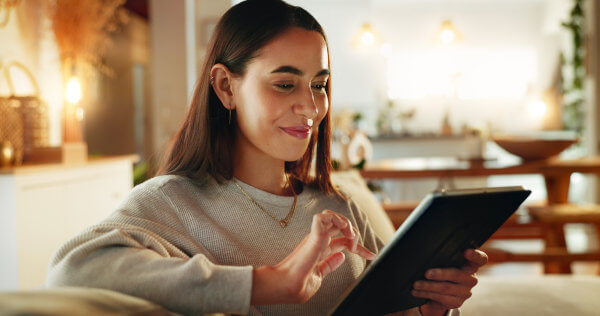 woman-applying-for-job-on-tablet